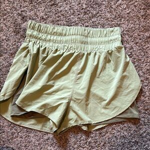 Green Athletic Shorts with Lightweight Fabric and Curved Hem